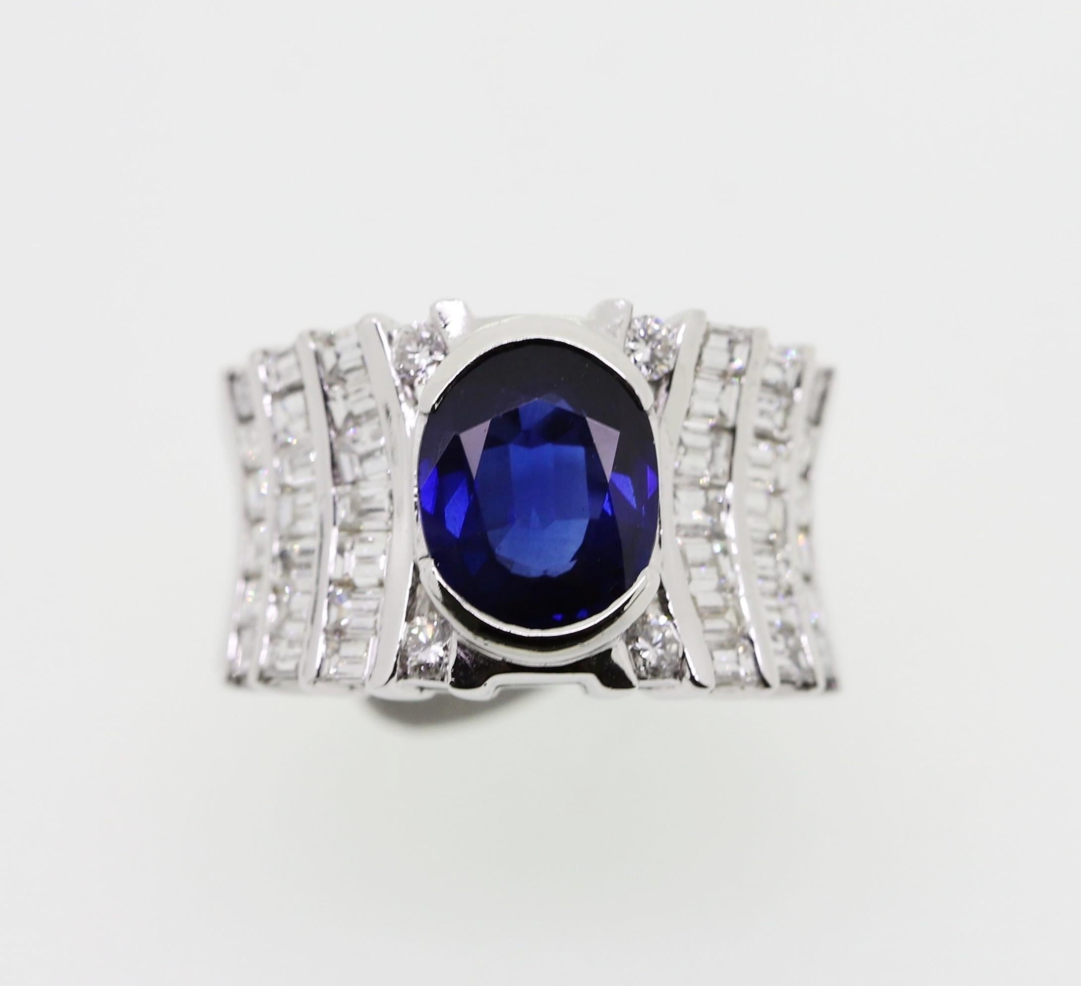 Oval Cut 3.20 Carat Oval Sapphire and White Diamonds Cocktail Ring For Sale