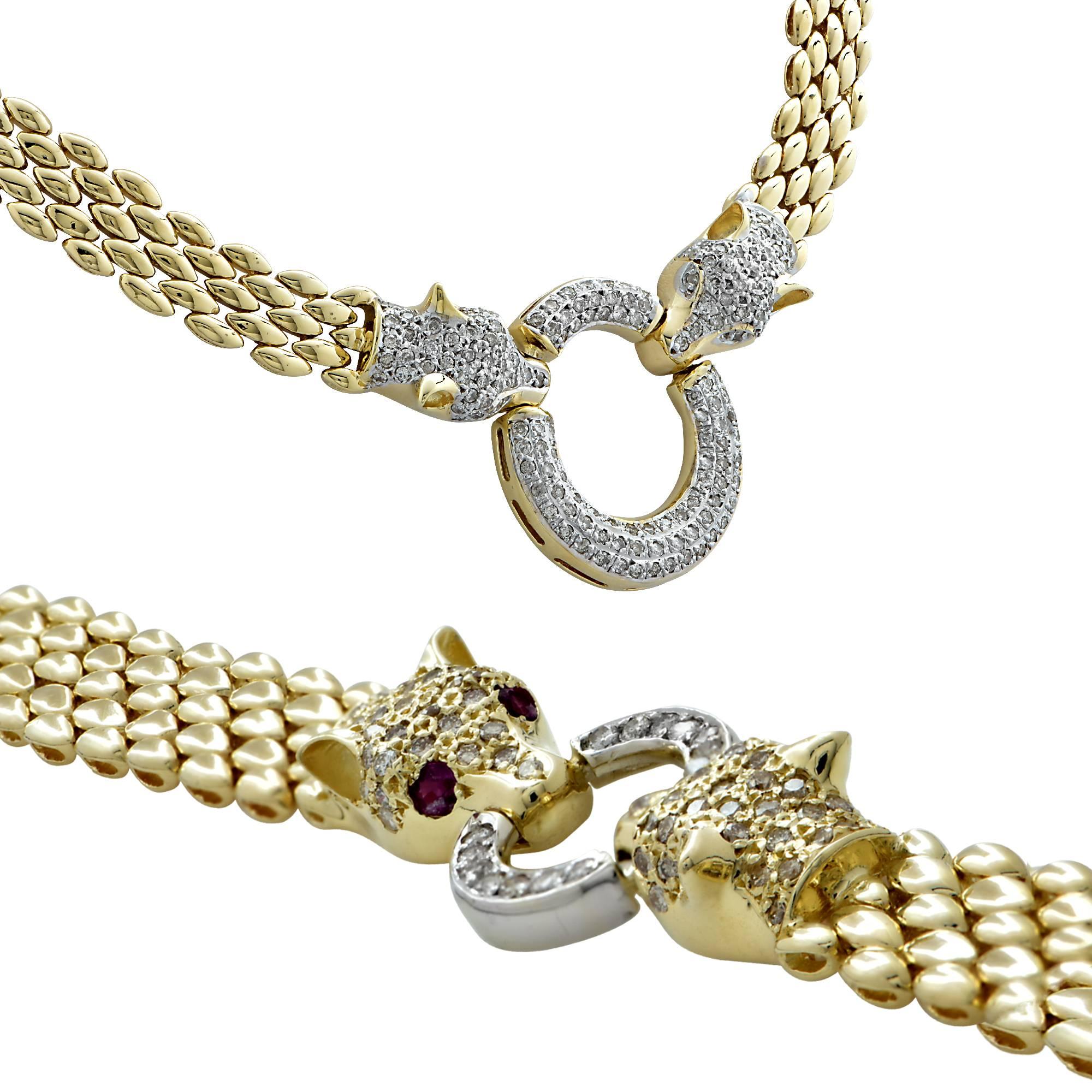 Seductive 14 Karat Yellow Gold necklace and bracelet set featuring four Panthers adorned with four rubies and 261 round brilliant cut diamonds weighing approximately 3.20 carats total weight, I-K color SI clarity. Necklace measures 16 inches long