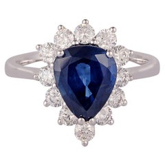 Bague cloutée en or 18 carats avec saphir bleu en forme de poire de 3,20 carats et diamants