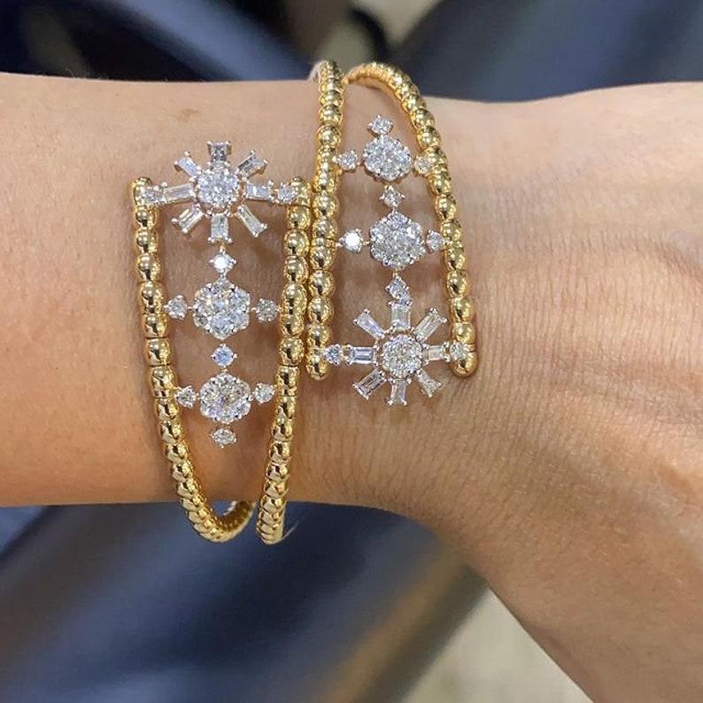 Cast from 14-karat yellow gold, this link bracelet is hand set with 3.20 carats of sparkling diamonds. Available in yellow, rose and white gold. 

FOLLOW MEGHNA JEWELS storefront to view the latest collection & exclusive pieces. Meghna Jewels is
