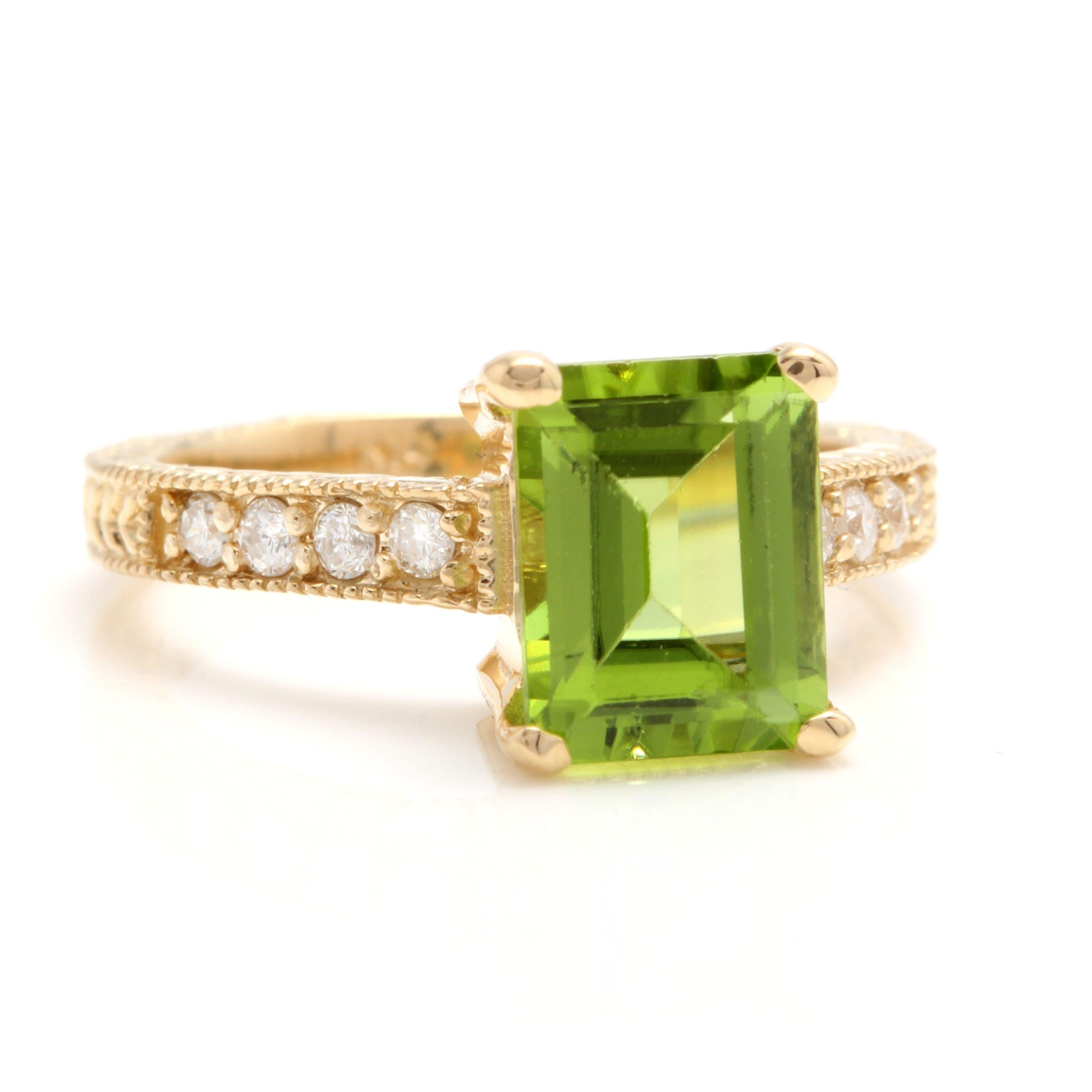 3.20 Carats Impressive Natural Peridot and Diamond 14K Yellow Gold Ring

Total Natural Peridot Weight is: Approx. 3.00 Carats

Peridot Measures: Approx. 9.00 x 7.00mm

Natural Round Diamonds Weight: Approx. 0.20 Carats (color G-H / Clarity