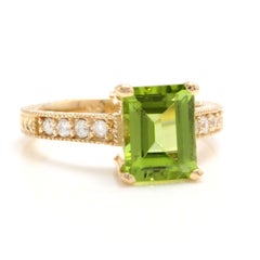 3.20 Carat Impressive Natural Peridot and Diamond 14 Karat Yellow Gold Ring