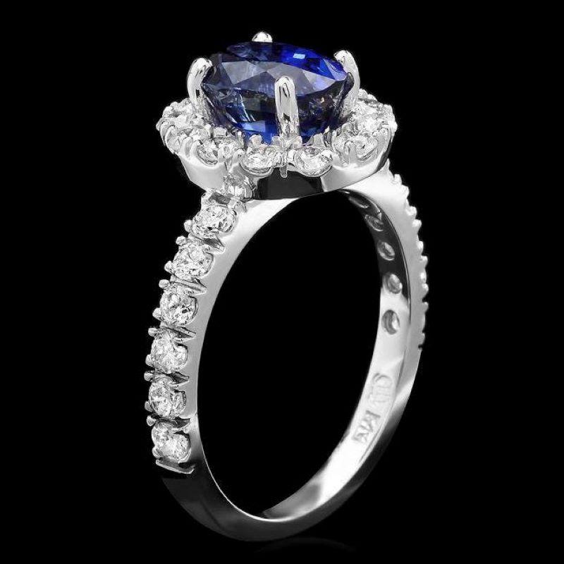 3.20 Carats Natural Blue Sapphire and Diamond 14K Solid White Gold Ring

Total Blue Sapphire Weight is: Approx. 2.30 Carats

Natural Sapphire Measures: Approx. 8.00 x 6.00mm

Sapphire treatment: Diffusion

Natural Round Diamonds Weight: Approx. 0.90
