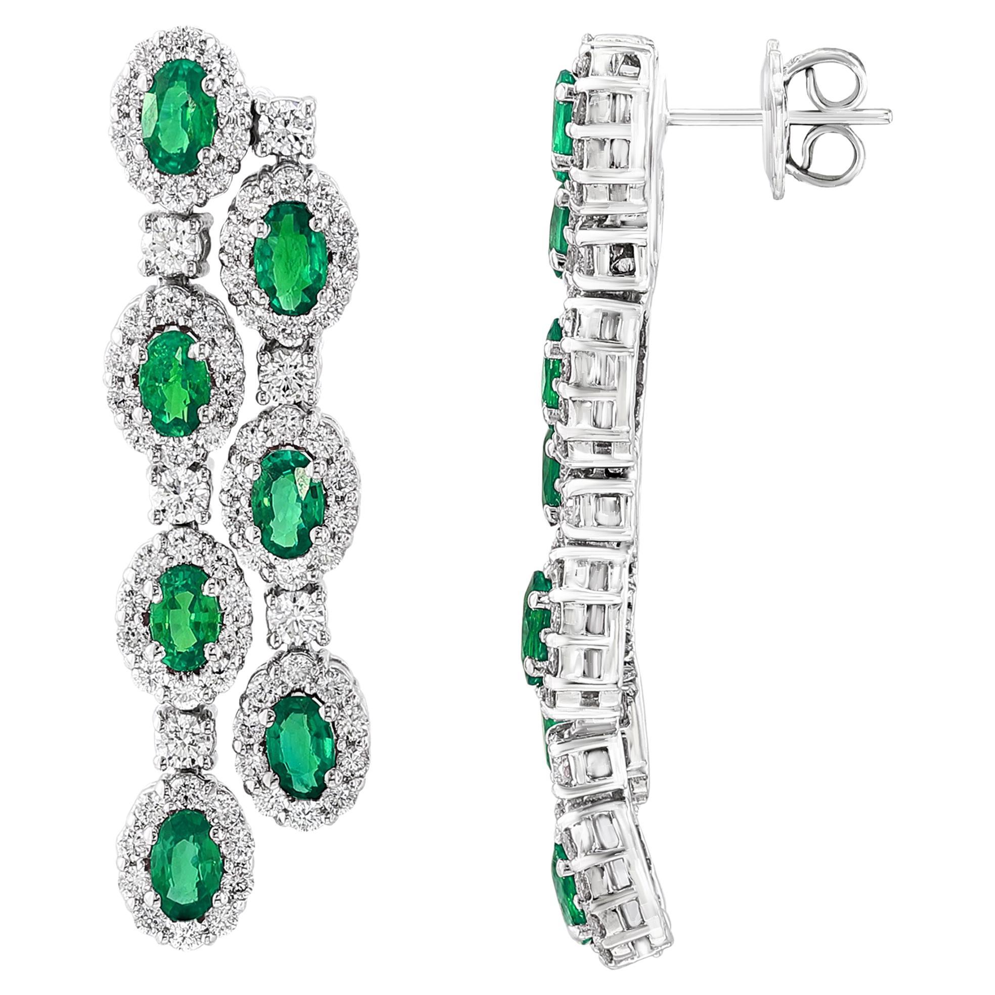 3.20 Carats Oval Cut Emeralds and Diamond Halo Dangle Earring in 14K White Gold