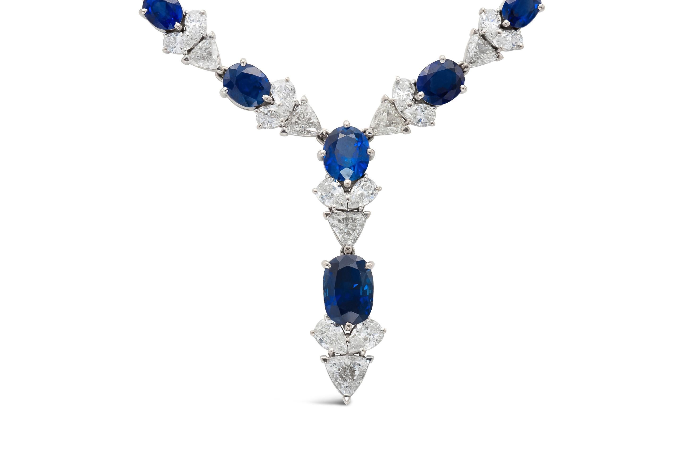 Finely crafted in 18k white gold with 31 Oval cut Sapphires weighing a total of approximately 32.00 carats, and Pear-Shaped and Trillion cut Diamonds weighing a total of approximately 26.00 carats.
16 1/2 inches long