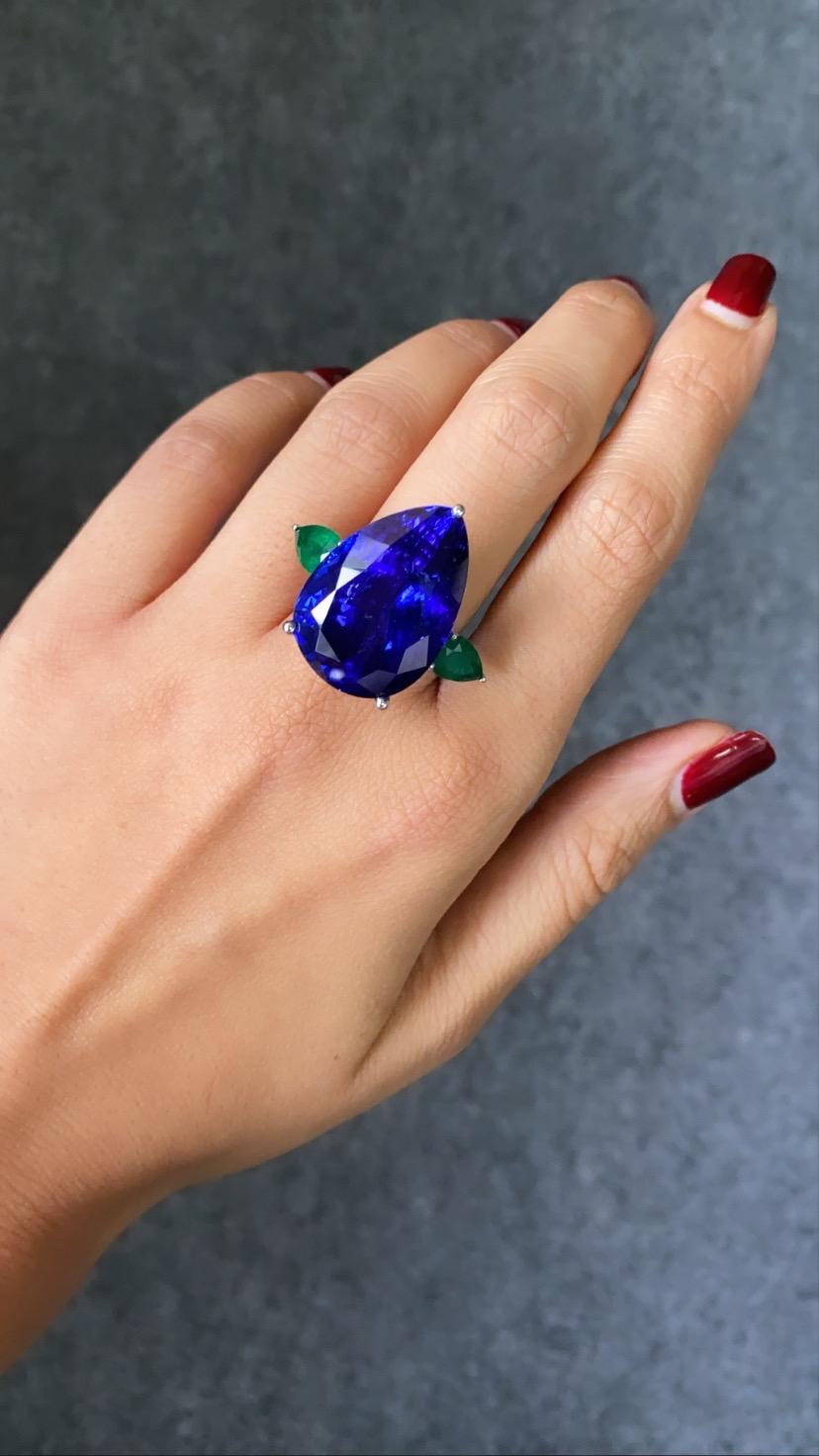 Pear Cut 32.05 Carat Pear Shape Tanzanite and Emerald Three-Stone Cocktail Ring For Sale