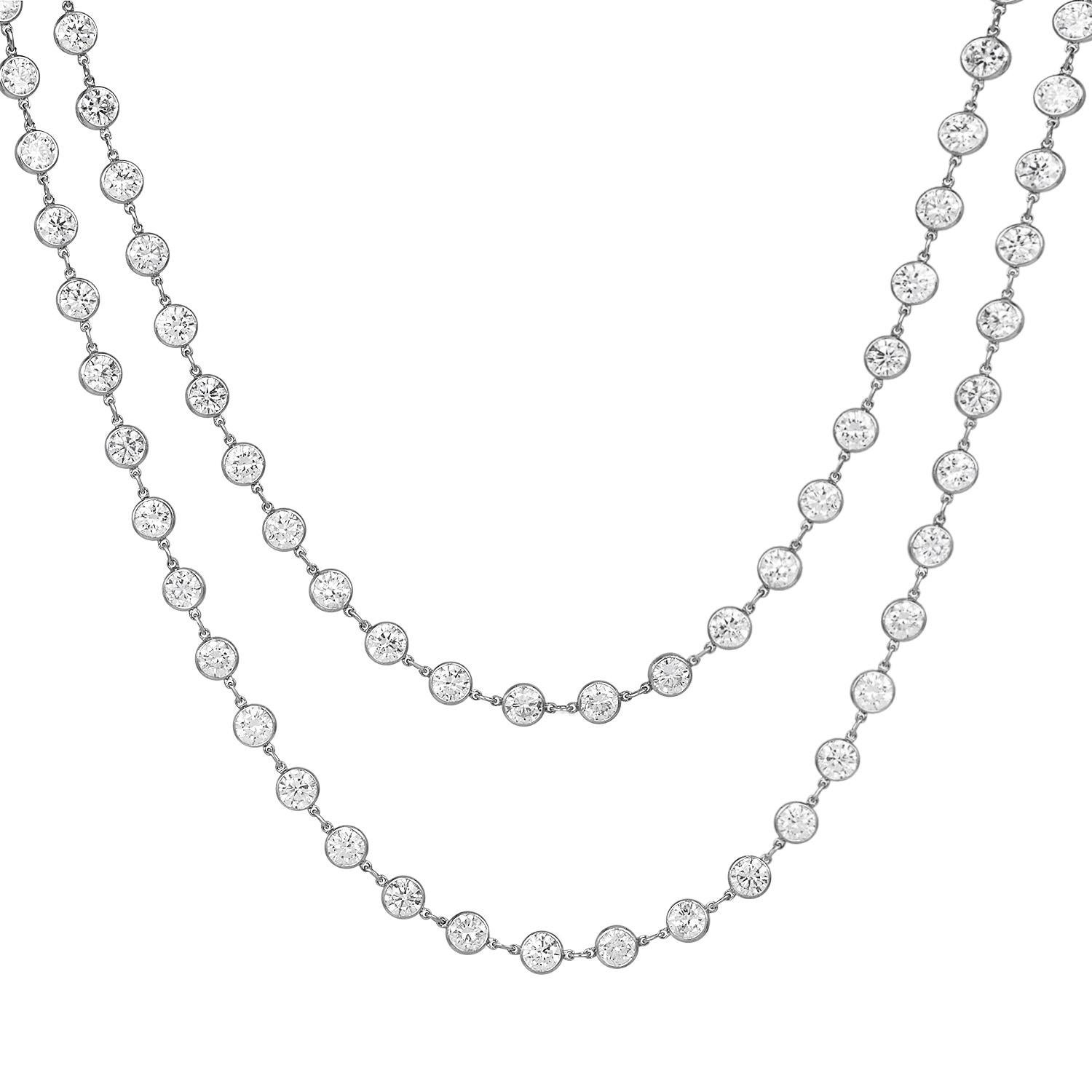 This shimmering and wearable diamond chain necklace is hand-crafted in solid platinum.

Weighing 32.5 grams and measuring 40” long. Exposing bezel-set, with approx. 120 high-quality round-cut diamonds, bezel-set, weighing approximately,