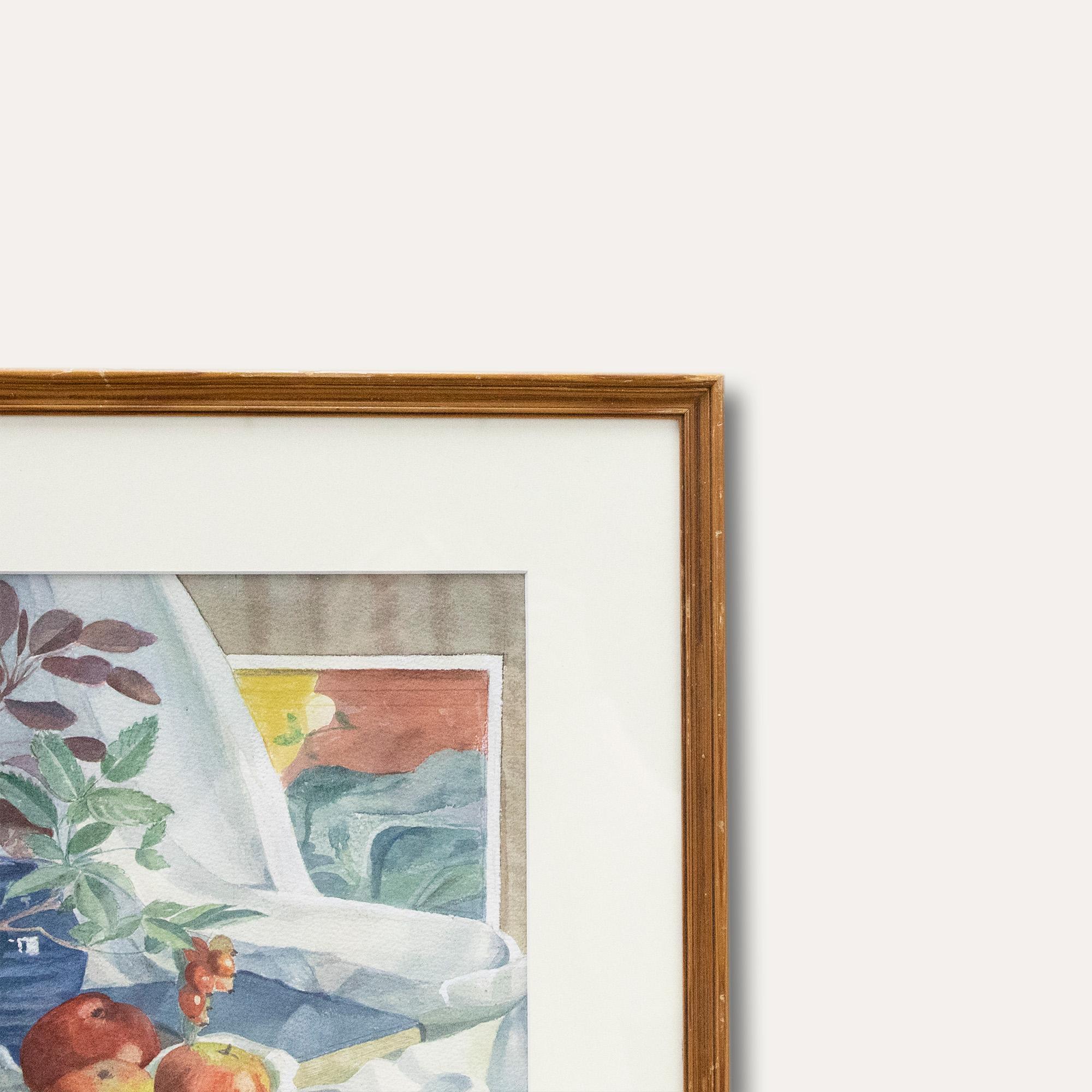 A charming watercolour study depicting apples, books and plants placed on a white cloth to make a delightful still life composition. Signed in graphite to the lower right. Presented in a light wooden frame. On paper.
