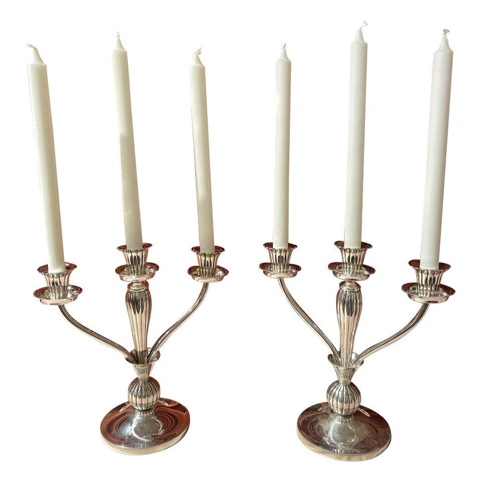 European Art Deco 925 silver pair of candlesticks. They are in Formal style with tremendous details, each piece stamped with fleur de leis and the 925 symbols. Quality construction allows you to remove any of the wax pans for cleaning, and the