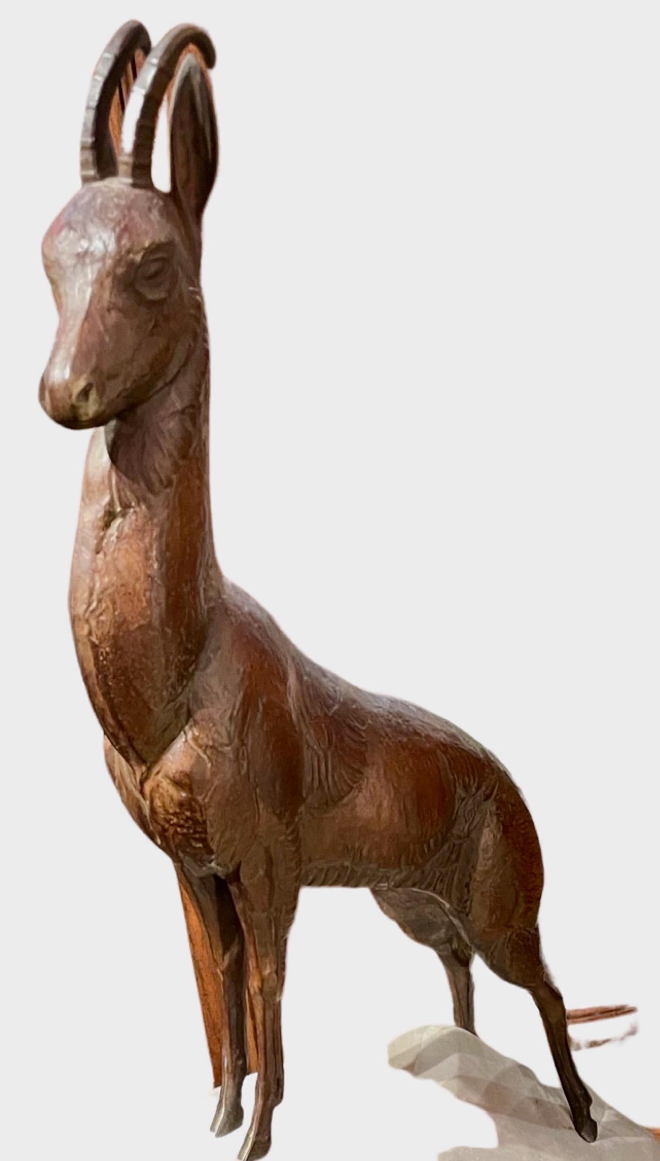 This piece stands 30 inches tall, a very statuesque pose for the Ibex, the fur and body details are also well defined as one can imagine this wild mountain goat in the most natural of settings. Very fine original condition. This rare piece, for the