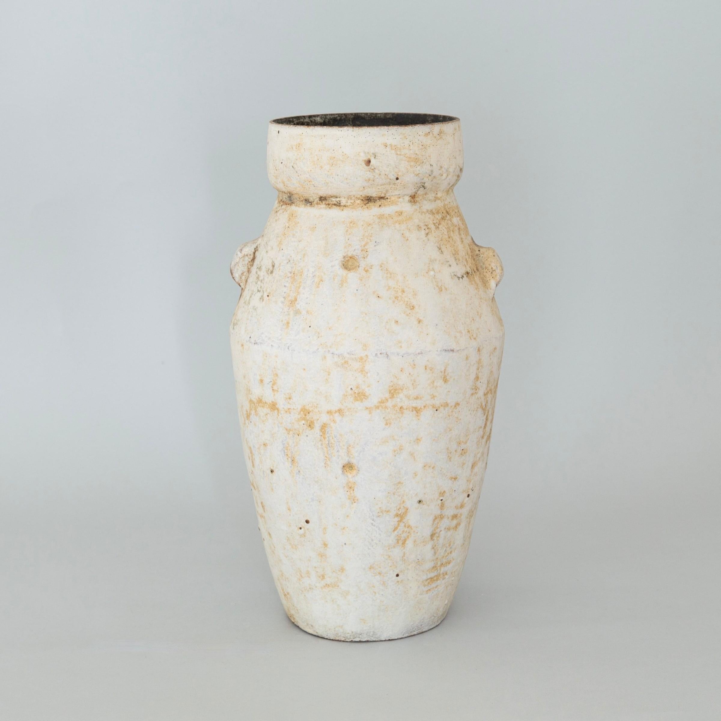 Stoneware Vessel V, Stoneware with Cream and Caramel Glazes by Paul Philp, 2021

Additional information:
Medium: Stoneware with Cream and Caramel Glazes
Height 32.5 cm (12 3/4 in)
Stamped with potter's seal on base

Philip began making ceramics over