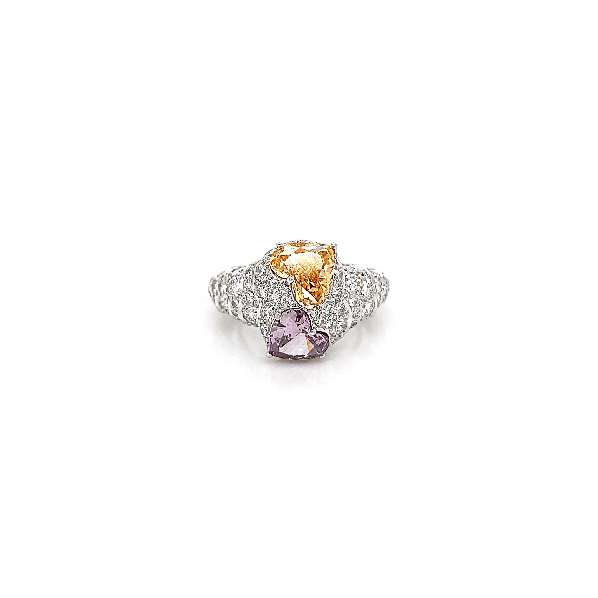 3.20 Total Carat Fancy Purple&Yellow Diamond Ladies Engagement Ring. GIA Certified.

It is the definition of a statement ring. This one-of-a-kind ring is not for the faint-hearted. The duet of natural yellow diamond and purple diamond will make the