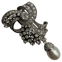 Spilla con diamante da 3,20 carati Spilla con diamante e perla in oro 18KT