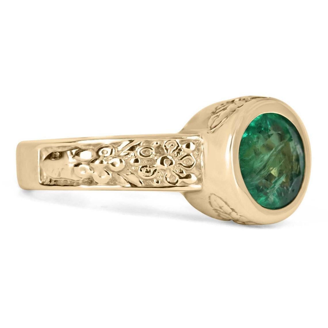 Featured here is a 3.20-carat oval, East to West solitaire 14k gold ring. The center stone is an oval emerald with beautiful eye clarity and transparency. The emerald has imperfections to the eye that blend with the beauty of the stone and make it