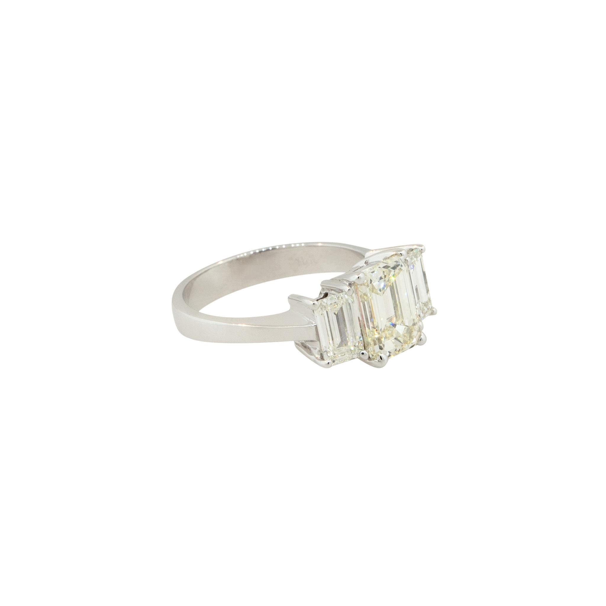 Women's 3.21 Carat 3 Stone Emerald Cut Diamond Engagement Ring 18 Karat In Stock For Sale