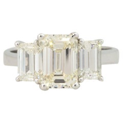 3.21 Carat 3 Stone Emerald Cut Diamond Engagement Ring 18 Karat In Stock
