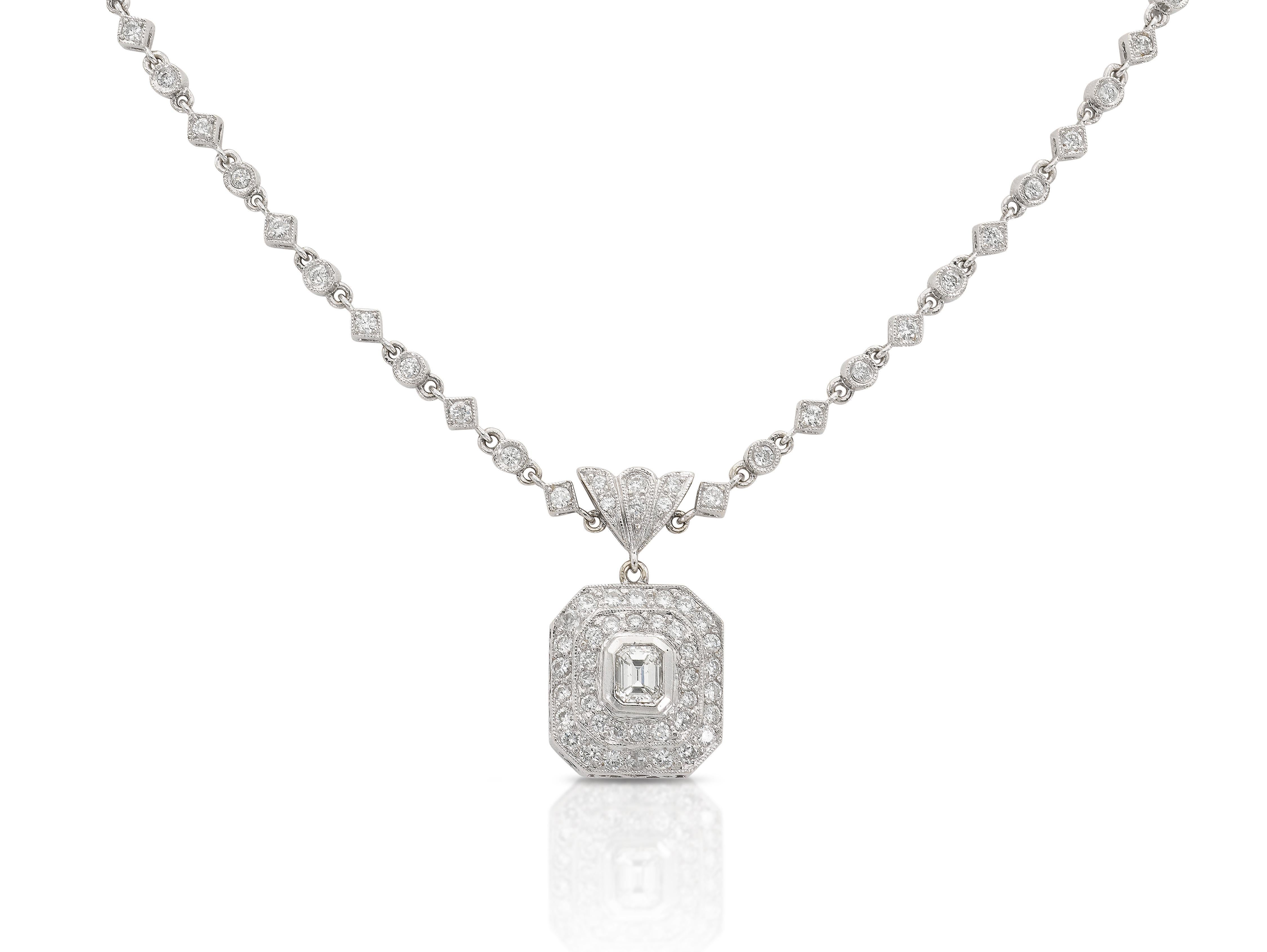 Finely crafted in 18k white gold with a 0.66 carat Emerald cut Diamond and Round Brilliant cut Diamonds weighing approximately a total of 2.55 carats.
16 1/2 inches long