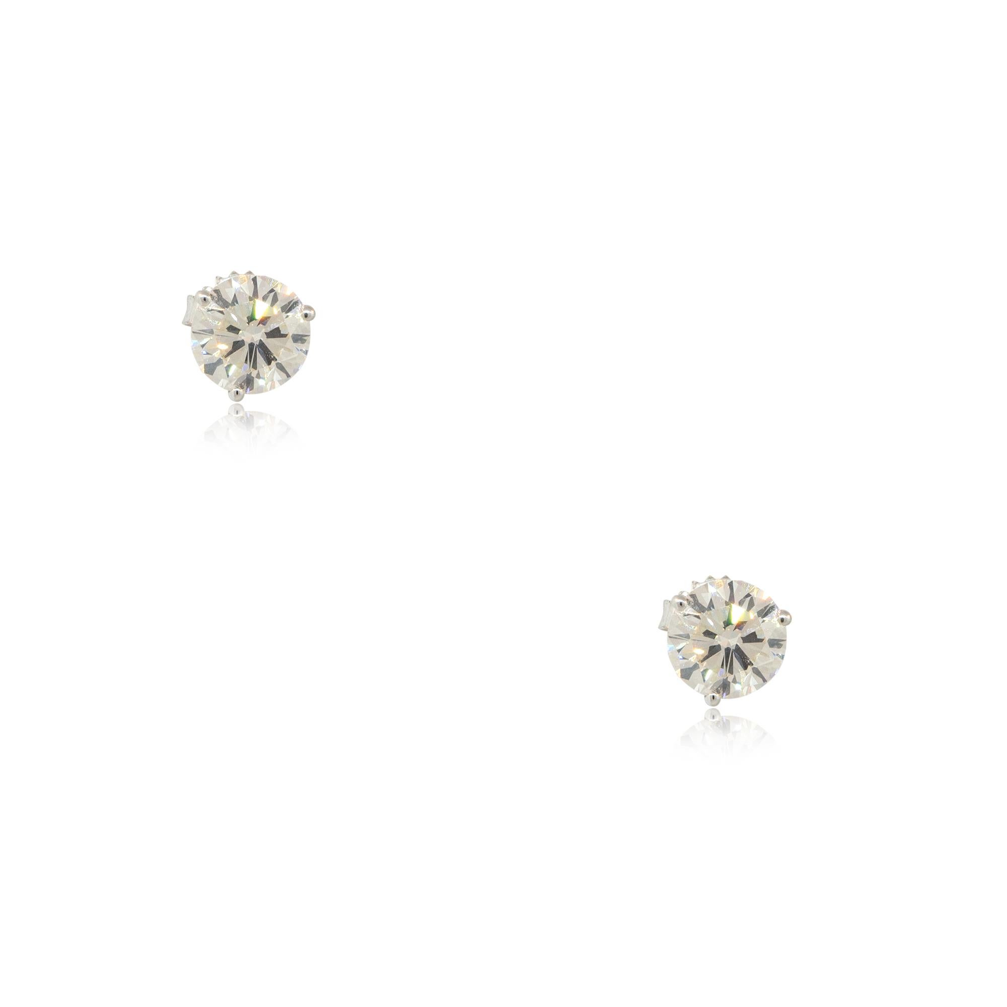 Material: Studs: 14k White Gold, Stud Jackets: 18k White Gold
Diamond Details: Main Diamonds are approx. 3.21ctw. Stud Jackets  are approx. 0.59ctw. Diamonds are H/I in color and SI in clarity
Earring Backs: Friction Backs
Weight: Studs: 1.3dwt,