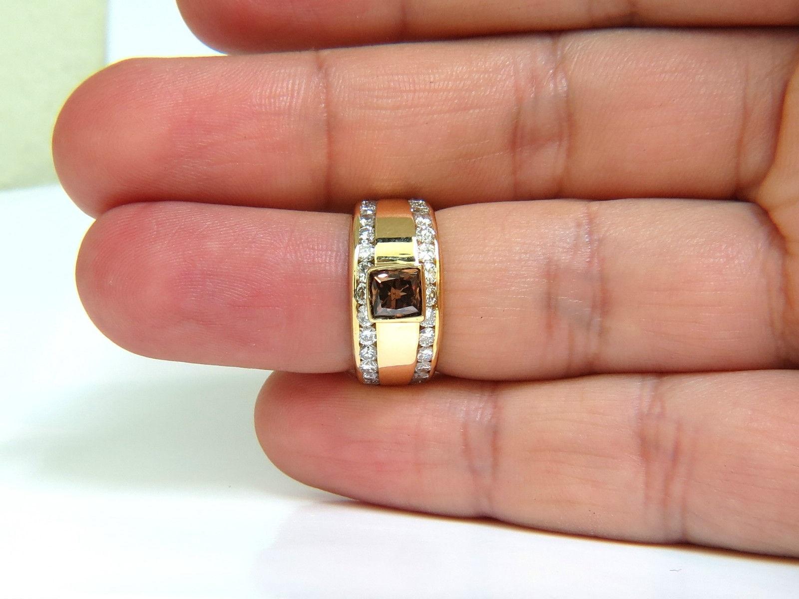1.21ct. Fancy Vivid Brown Diamond

Vs-2 clarity.

4.6 X 4.3mm





Side diamonds:

2.00ct. 

G-color, Vs-2 clarity.

14kt. yellow gold 

depth of ring: 4.3mm

 6.8 grams total weight



Excellent well made mounting

thick and solid for the everyday