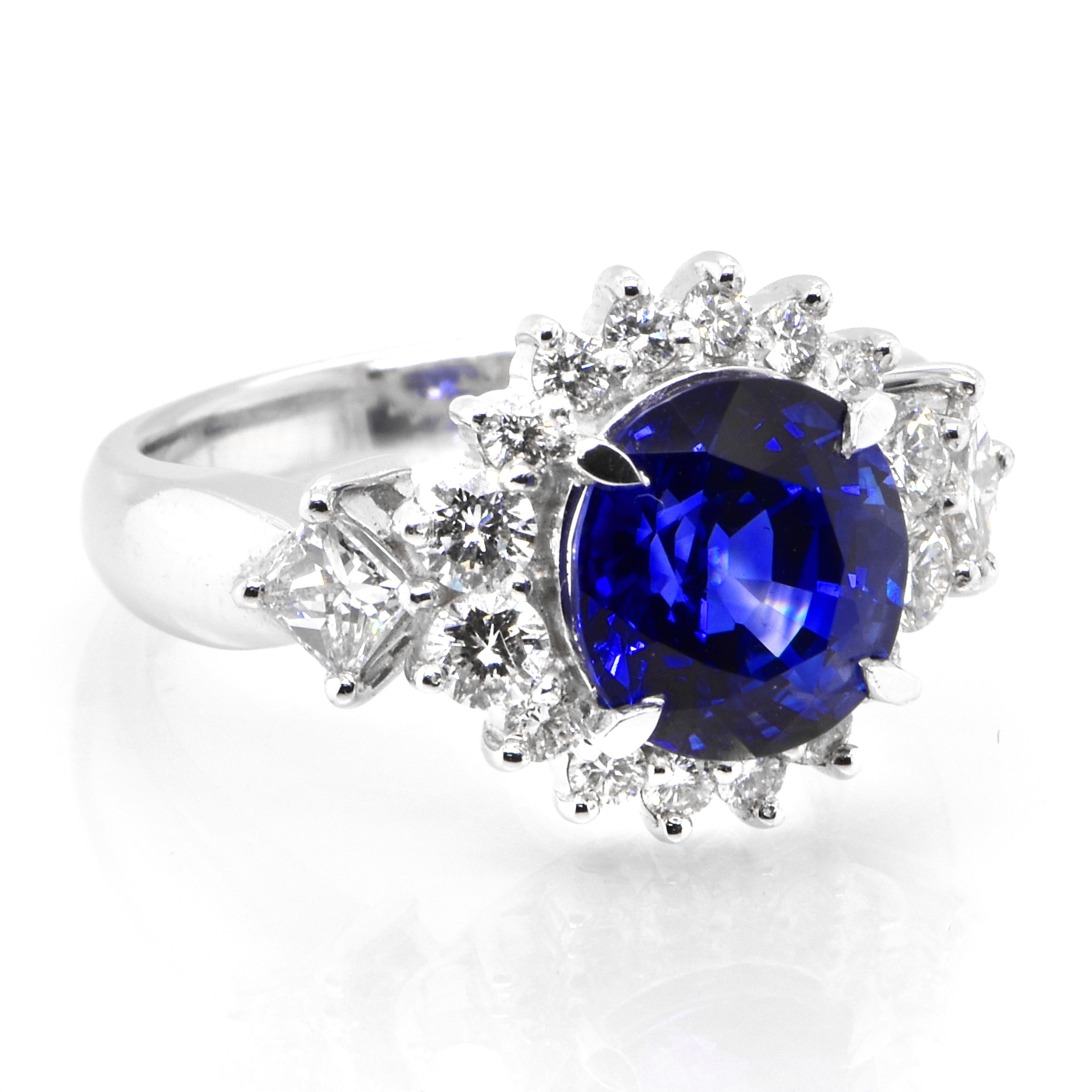 Modern 3.21 Carat Natural Royal Blue Color Sapphire and Diamond Ring Made in Platinum For Sale