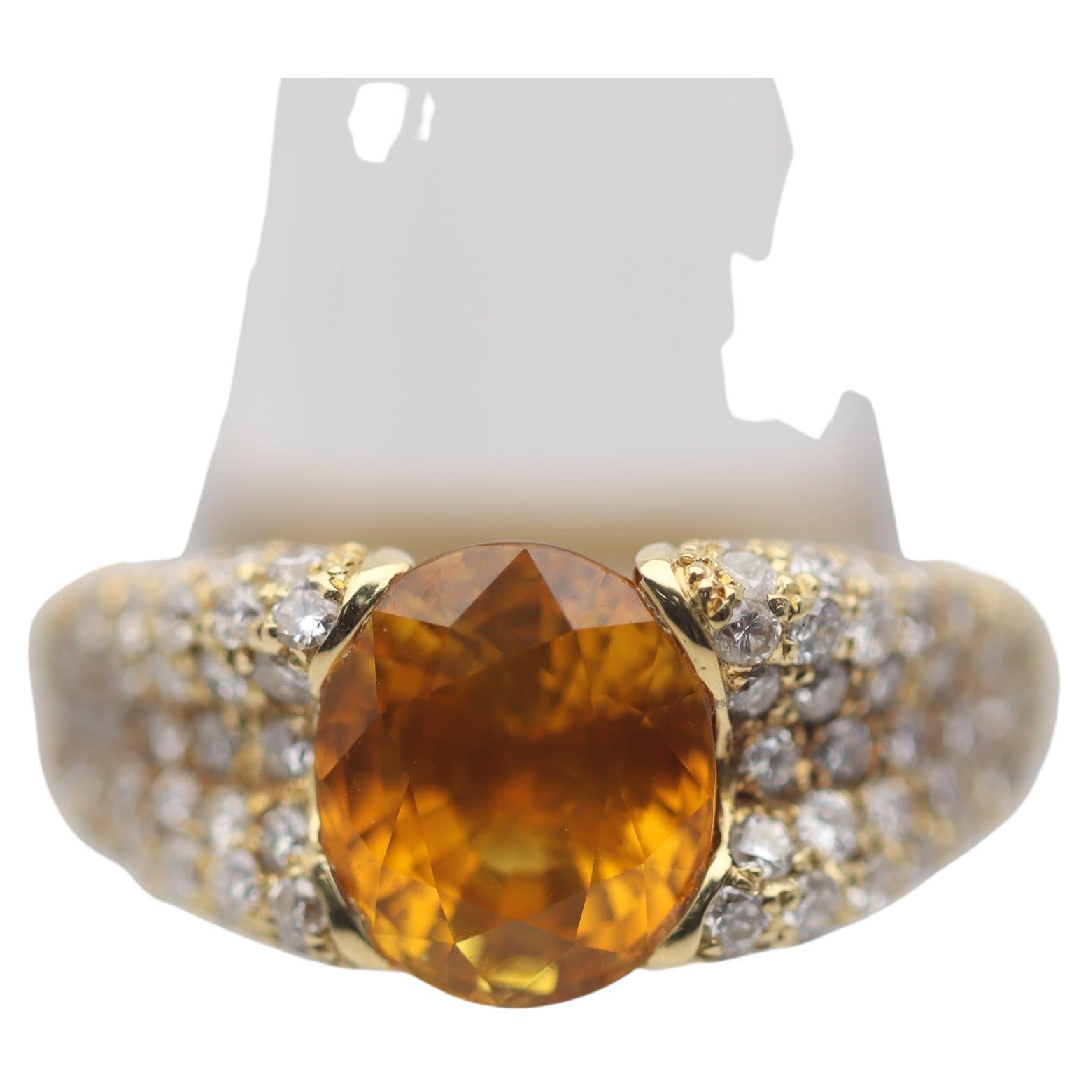 Goldring mit 3,21 Karat orangefarbenem Saphir und Diamant