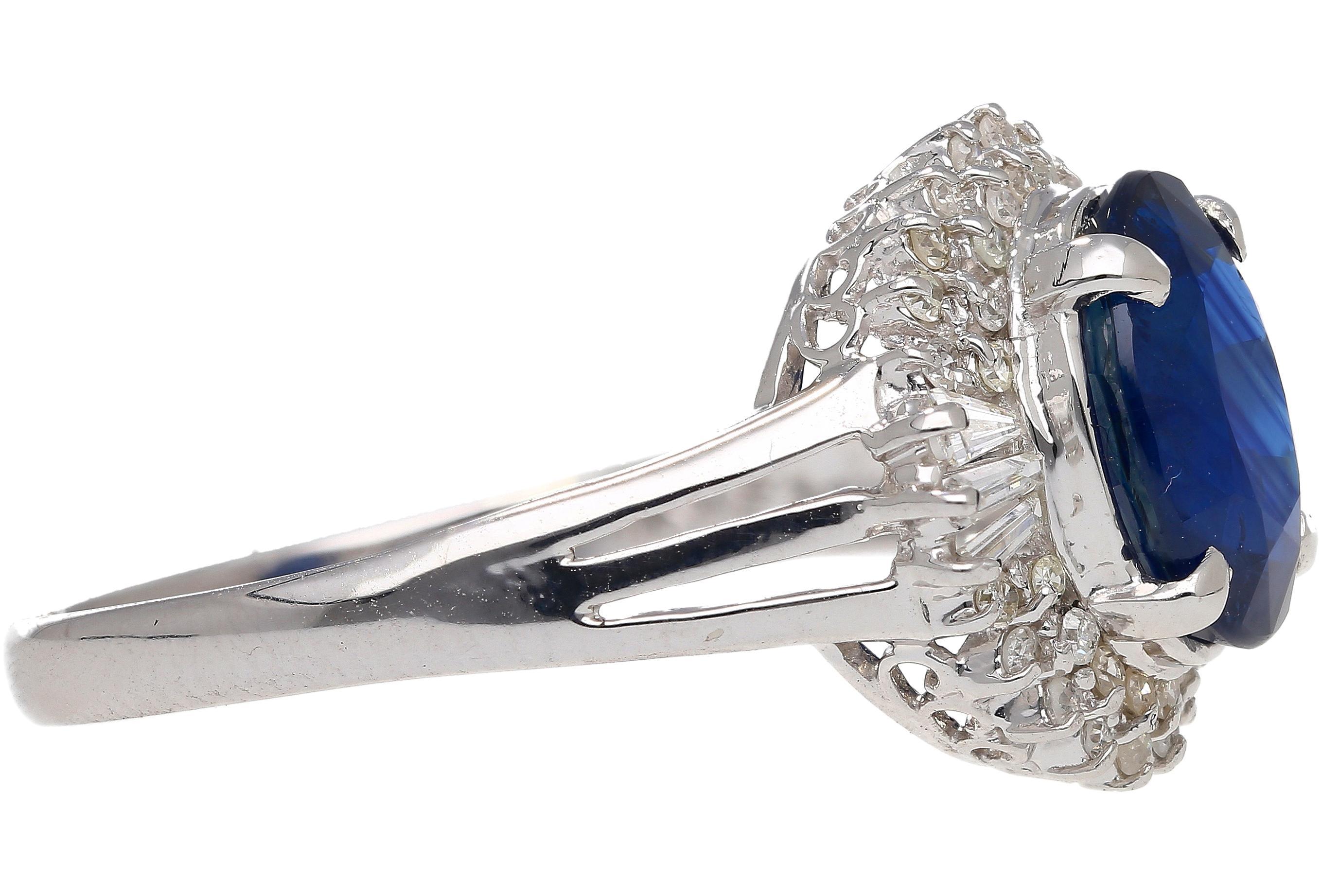 Women's 3.21 Carat Oval Cut Blue Sapphire and Diamond in Platinum Ring For Sale