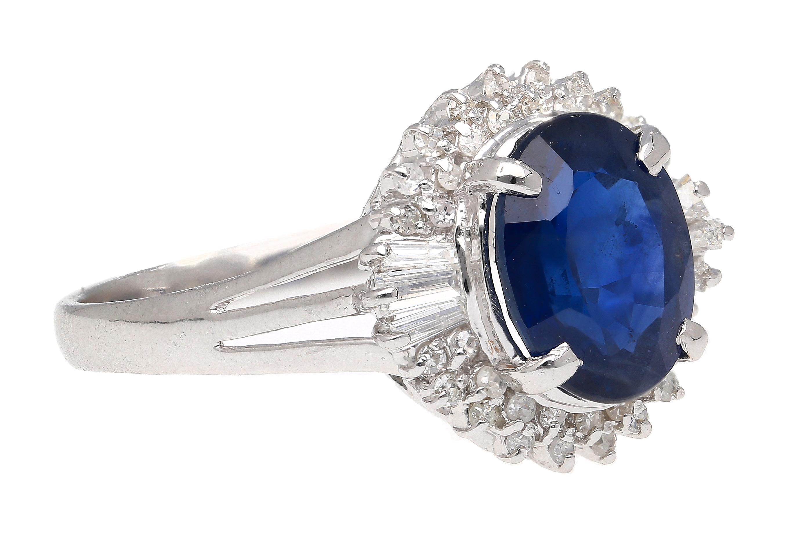 3.21 Carat Oval Cut Blue Sapphire and Diamond in Platinum Ring For Sale 1