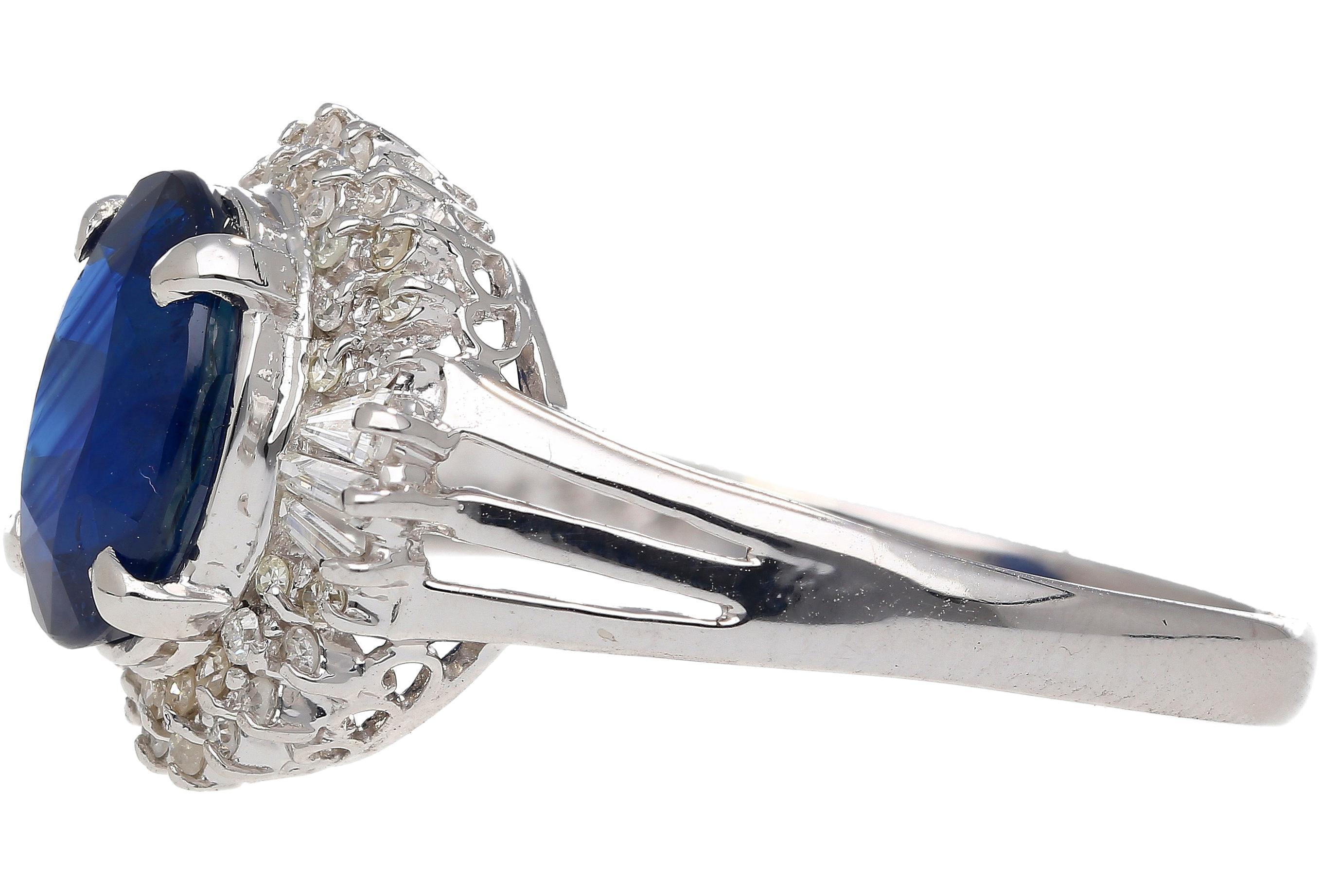 3.21 Carat Oval Cut Blue Sapphire and Diamond in Platinum Ring For Sale 2