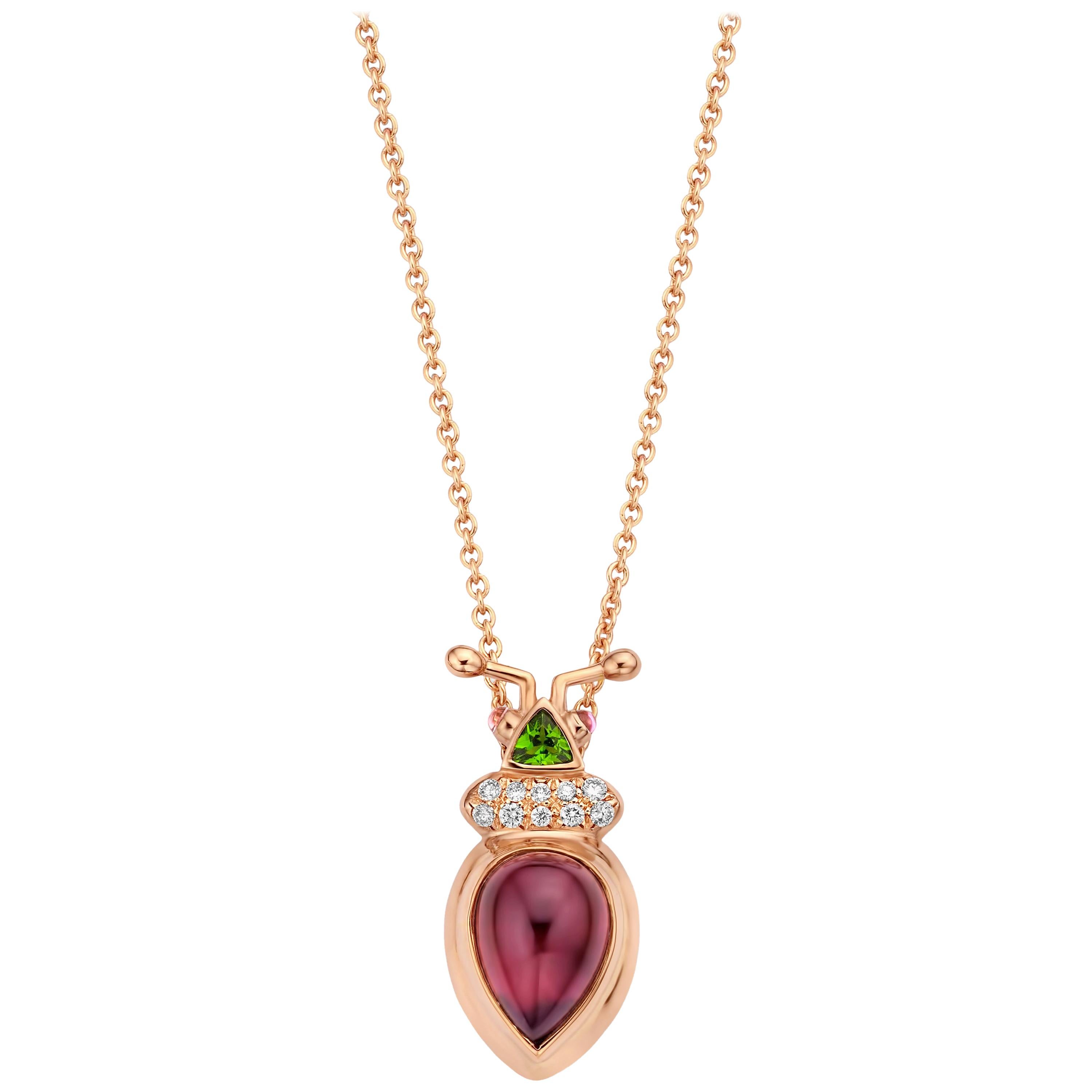One of a kind lucky beetle necklace in 18K rose gold 10g set with the finest diamonds in brilliant cut 0,09Ct (VVS/DEF quality) and one natural, royal purple garnet in pear cabochon cut 3,21Ct. The head is set with a tsavorite in trillion cut and