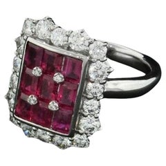 Anello con rubino baguette e diamante rotondo da 3,21 carati in platino