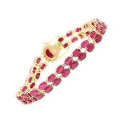 Armband aus 14 Karat massivem Gelbgold mit Rubin und Diamanten