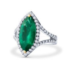 3.21ct Marquise Emerald and 1.07ct Round Diamond Halo Split Shank Platinum Ring