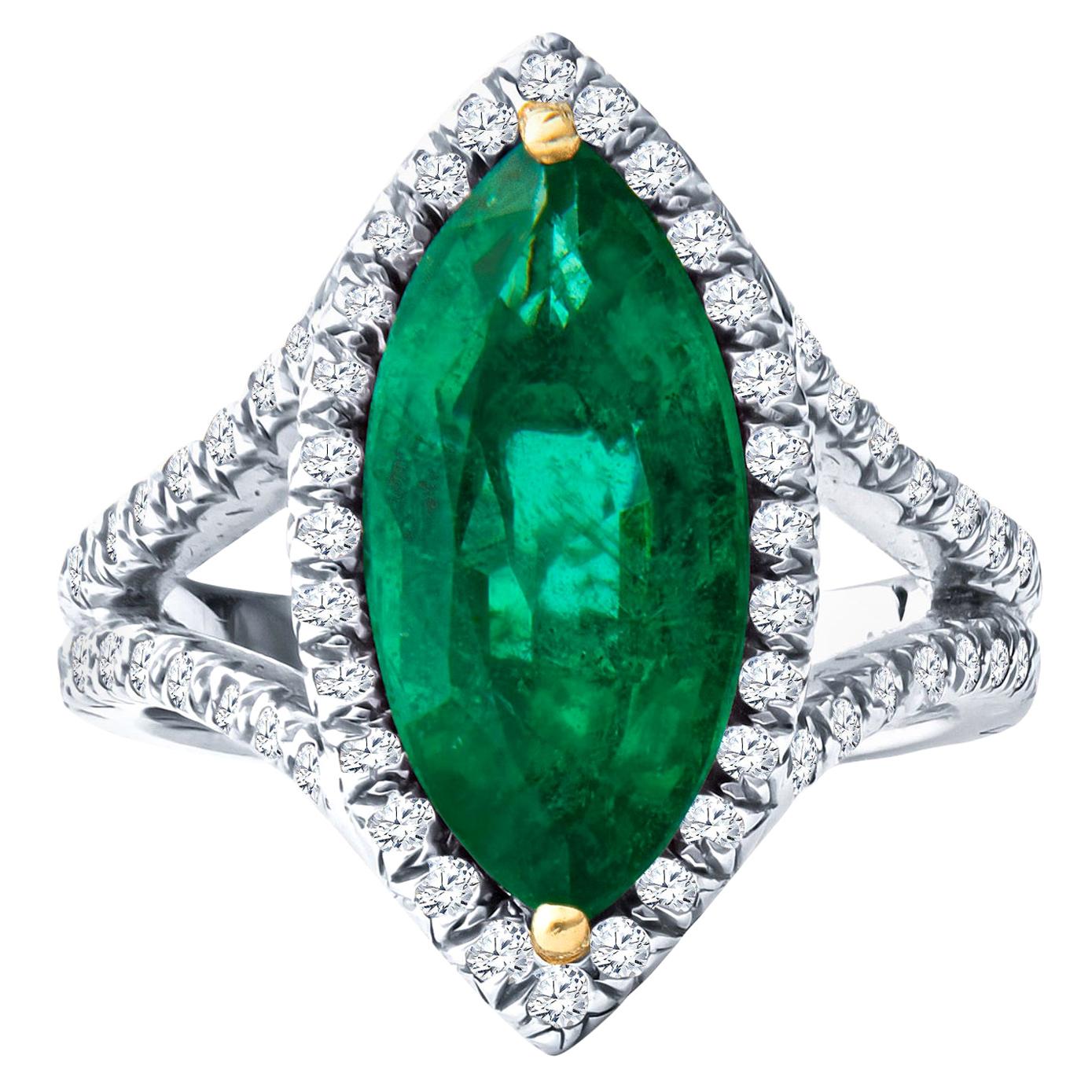3.21ct Marquise Emerald and 1.07ct Round Diamond Halo Split Shank Platinum Ring For Sale