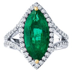 3.21ct Marquise Emerald and 1.07ct Round Diamond Halo Split Shank Platinum Ring