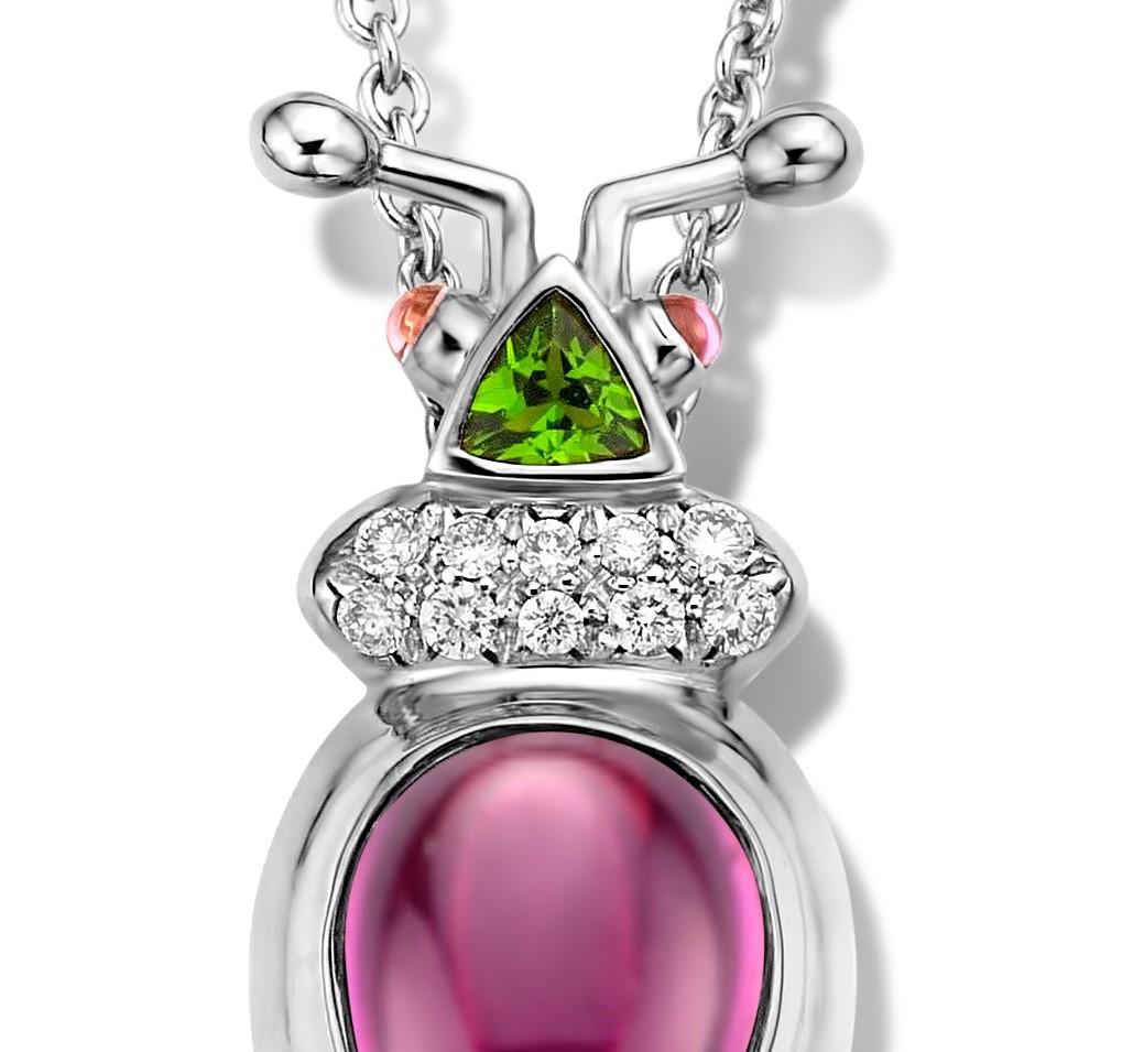 One of a kind lucky beetle necklace in 18K white gold 10g set with the finest diamonds in brilliant cut 0,09Ct (VVS/DEF quality) and one natural, royal purple garnet in pear cabouchon cut 3,21Ct. The head is set with a tsavorite in trillion cut and