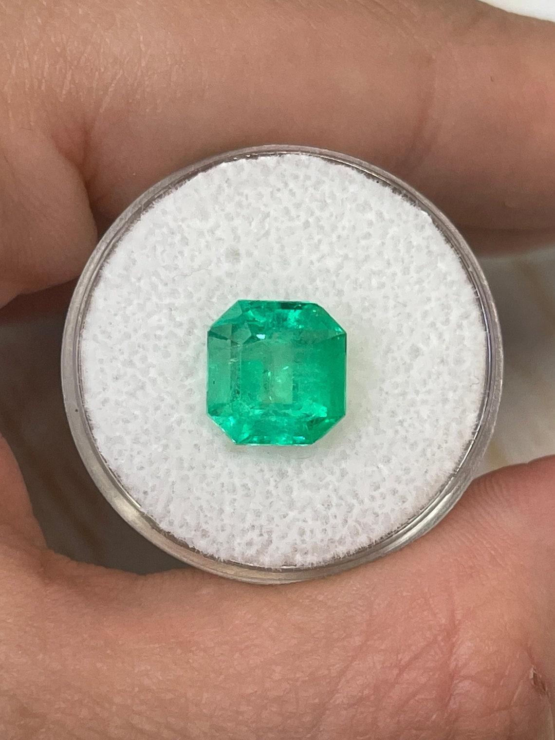 Stone: Emerald
Weight: 3.21carats
Shape: Asscher Cut
Clarity: Transparent
Luster: Excellent
Color: Medium Green
Measurements: 9.43mm x 9.08mm x 6.51mm
Geographic Origin: Colombia
Treatment: Natural, Oiling

Comments: Due to their growth conditions