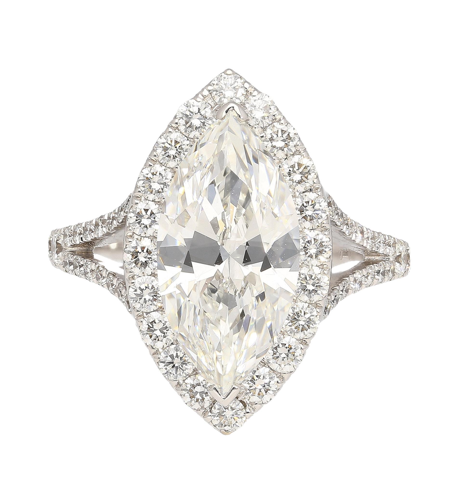 Jewelry Details:
Item Type: Diamond Ring
Metal Type: 18K White Gold
Weight: 4.25 grams
Gold Color: White
Ring Size: 6
Center Stone Details:
Gemstone Type: Diamond
Shape: Marquise
Carat: 3.22 Carats
Color: G
Clarity: VS1
Certification: GIA Certified