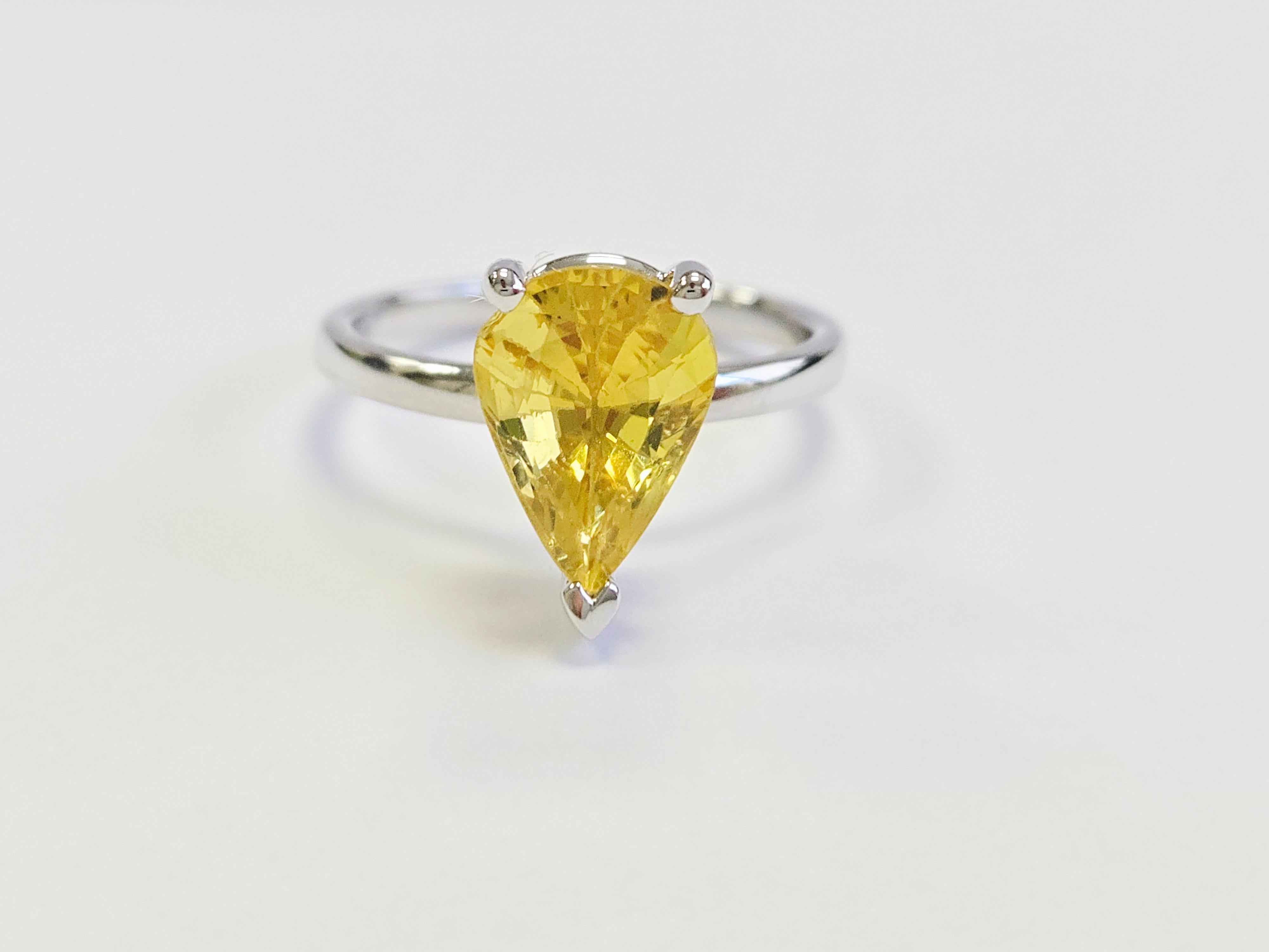 Stunning 3.22-Carat Natural Pear-Shaped Intense Yellow Sapphire Ring in 14K White Gold

This elegant ring features a vibrant 3.22-carat natural pear-shaped intense yellow sapphire, known for its rich, captivating color and remarkable clarity. The
