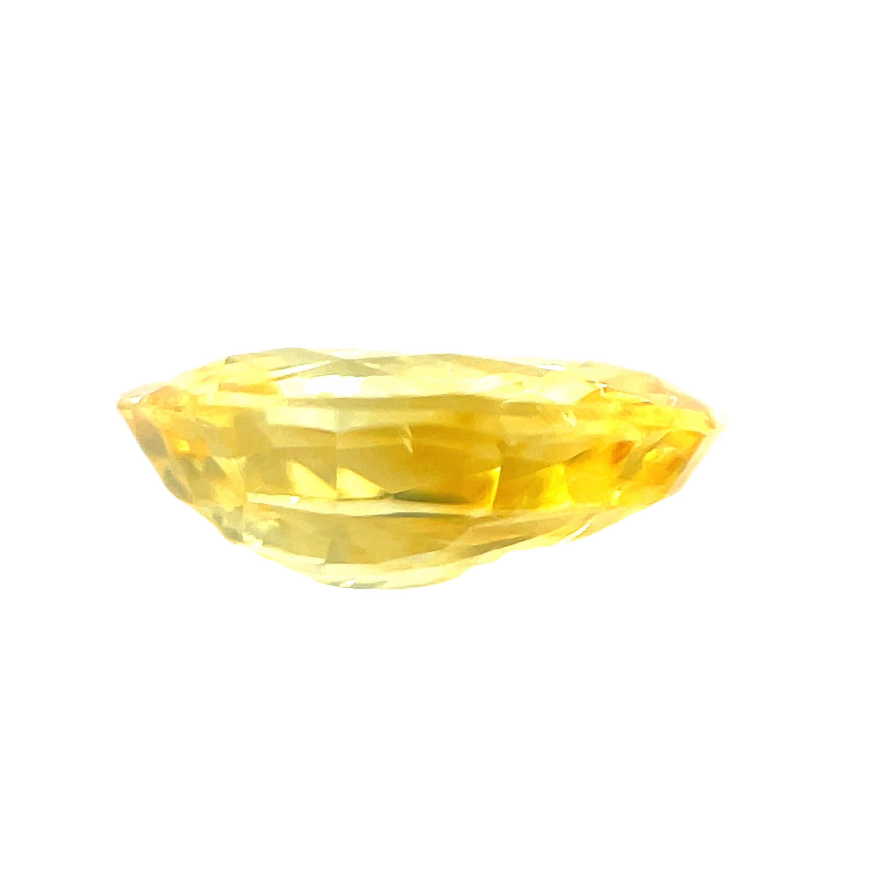 This bright lemon yellow sapphire with its sparkling golden highlights will make a gorgeous piece of jewelry! It weighs 3.22 carats and is a pleasing oval shape with the face-up appearance of a much larger stone! This gem would be perfect in a
