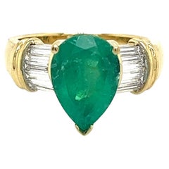 3.22 Carat Pear Cut Colombian Emerald With Baguette Diamond Side Stone 18k Ring