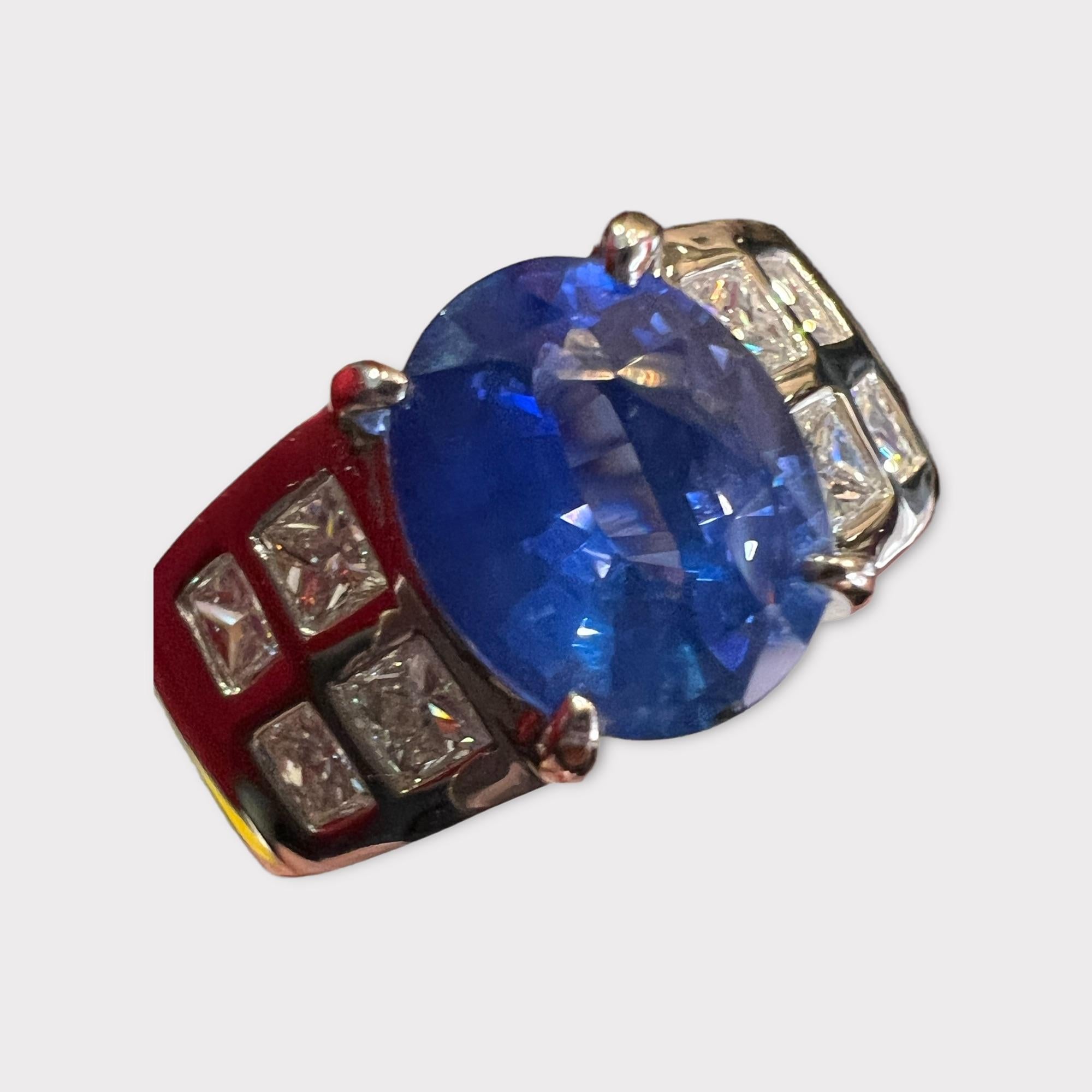 Magnificent blue sapphire of 3.23 Carat surrounded by 8 princess cut diamonds for 0.95 Carat in total, 18 carat gold cocktail ring.
total weight: 12.50 grams
size: 54.5 or 6 -3/4
dimension of the blue sapphire: 1cm / 0.70 cm