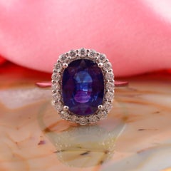3.23 Ct Blue Sapphire 0.53 Ct Diamond Halo 18 Karat White Gold Engagement Ring
