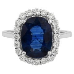 3.23 Ct Blue Sapphire 0.53 Ct Diamond Halo 18 Karat White Gold Engagement Ring