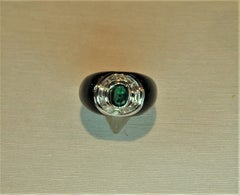 3.23 Ct Diamonds, 1.33 Ct Oval Emerald, Gold and BlackEnamel cocktail ring