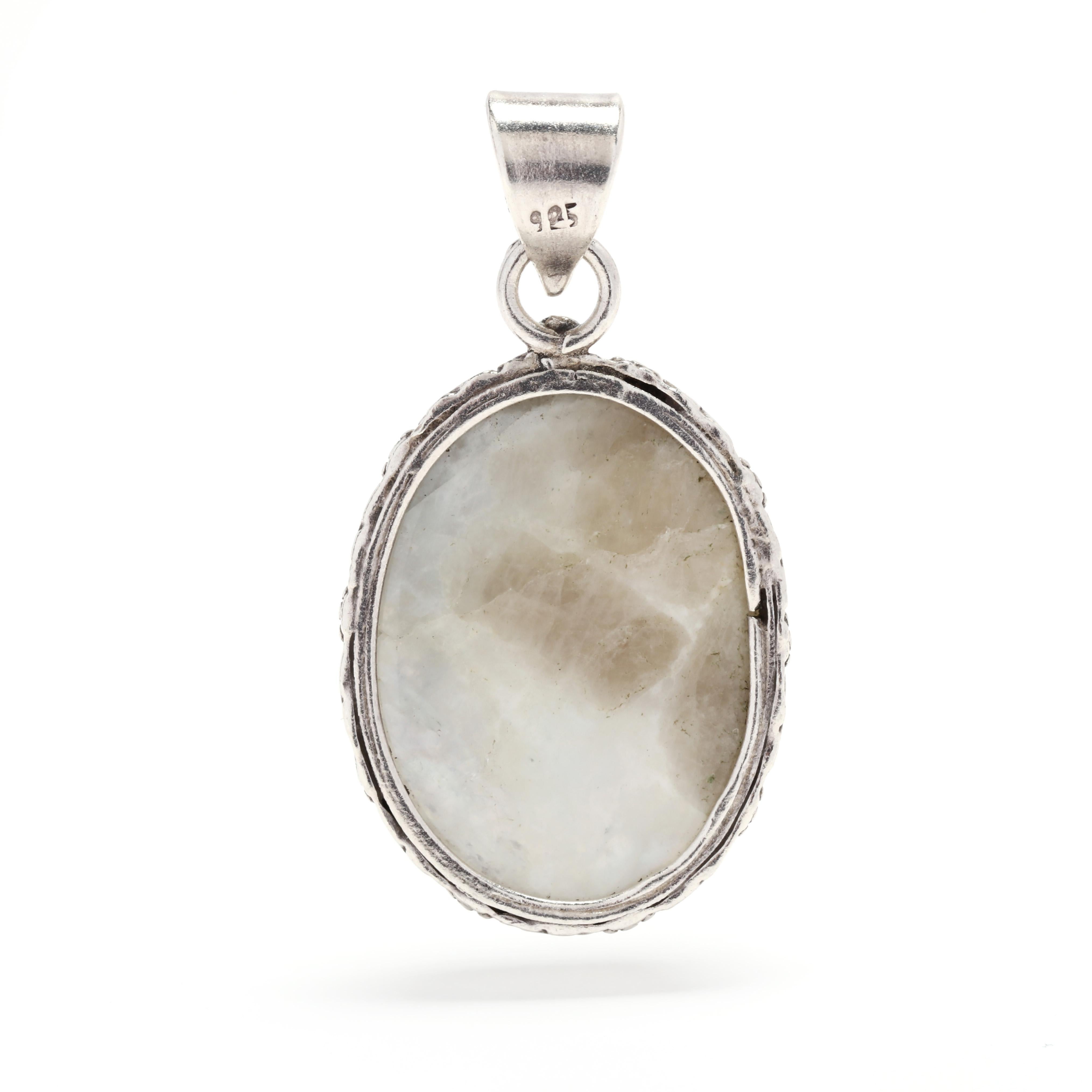 This beautiful vintage moonstone pendant will be a conversation-starter! Crafted from sterling silver, this large pendant features an eye-catching 32.3 carat moonstone gemstone. Its unique design and impressive size make it a showstopper. Perfect