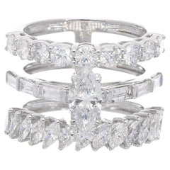 Bague à trois anneaux en or blanc 18 carats avec diamants baguettes et ronds de 3,24 carats