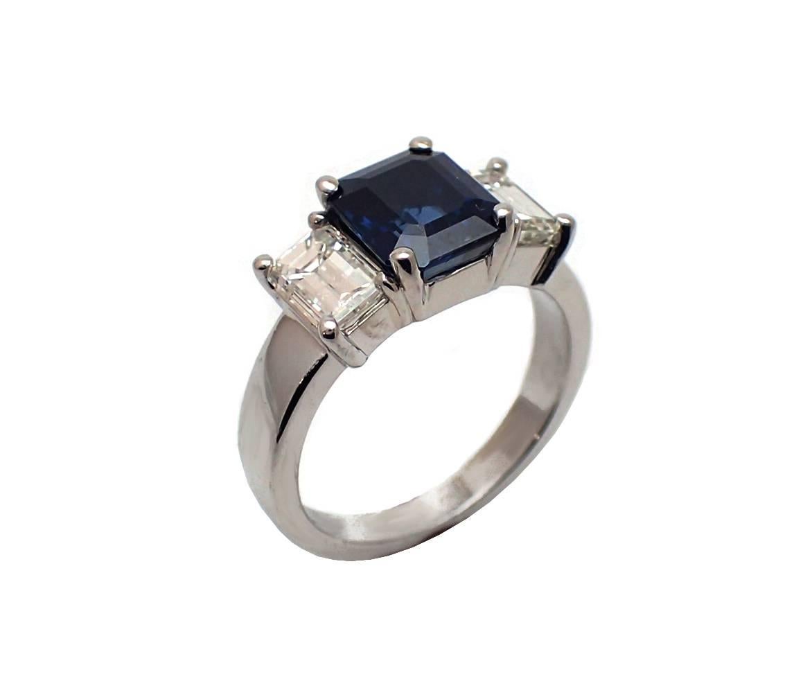 Contemporary 3.24 Carat Emerald Cut Sapphire and Diamond Ring in Platinum For Sale