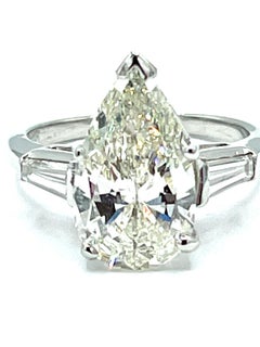 3.24 Carat Pear Shape Diamond and Tapered Baguette Diamond Platinum Ring