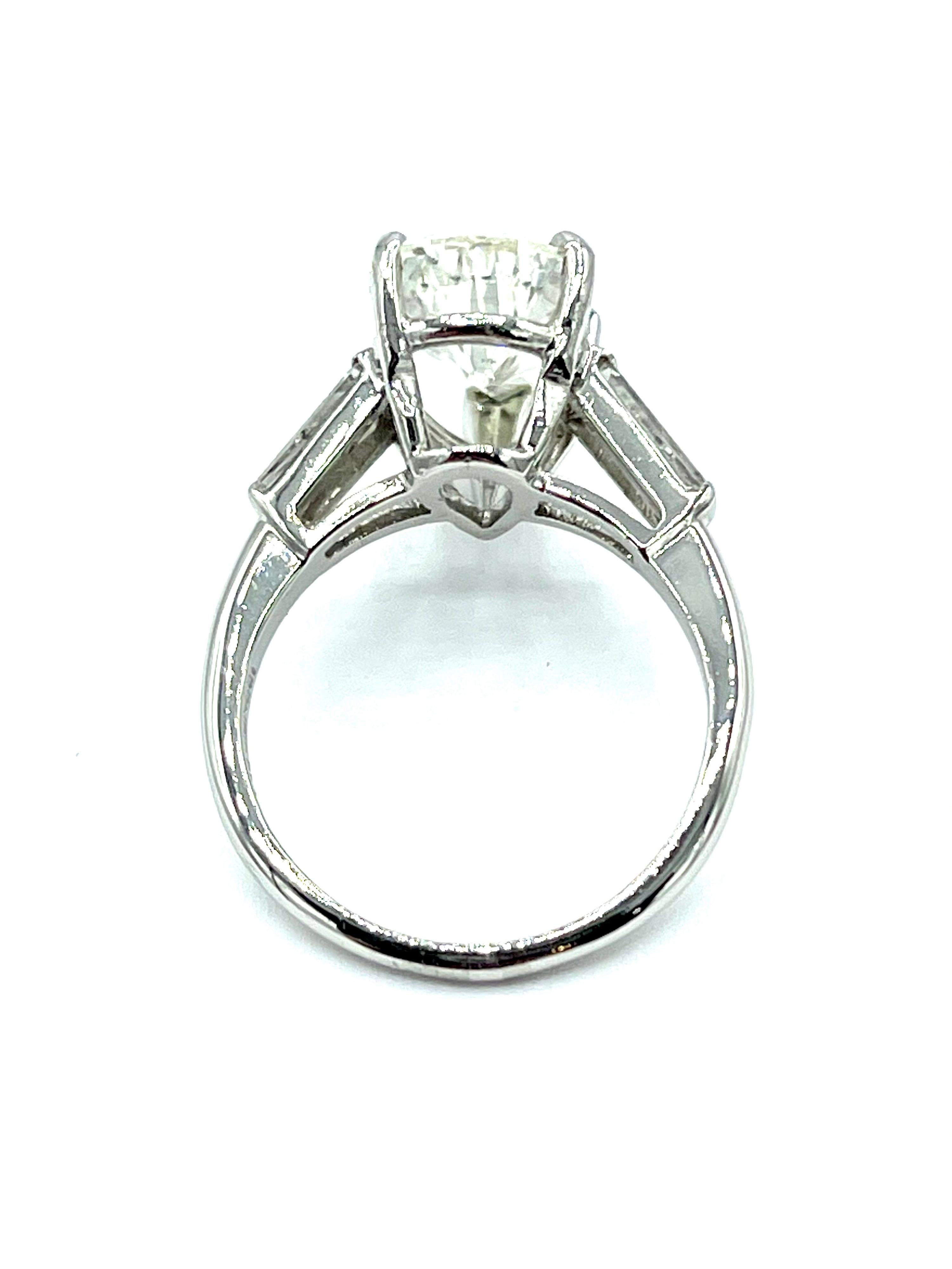 3.24 Carat Pear Shape Diamond and Tapered Baguette Diamond Platinum Ring In Excellent Condition In Chevy Chase, MD