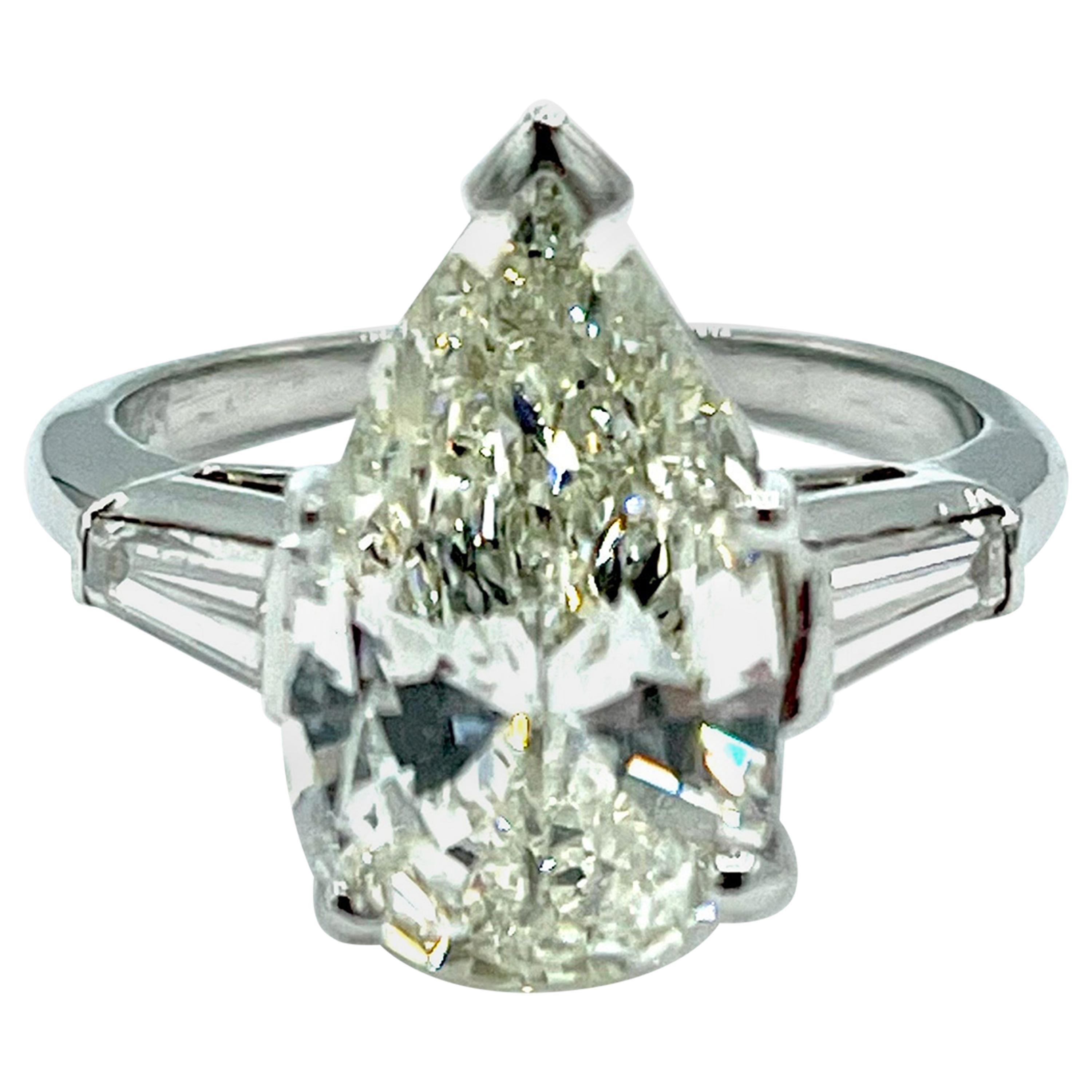 3.24 Carat Pear Shape Diamond and Tapered Baguette Diamond Platinum Ring
